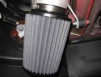 t. Install the Dryflow high-performance air filter to the intake tube with a hose clamp as shown and fully tighten. u.