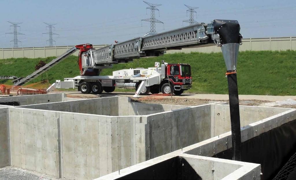 The five-section boom and fully hydraulic conveyor handle concrete slumps from 0 to 12 inches and materials ranging from sand to 4-inch rock.
