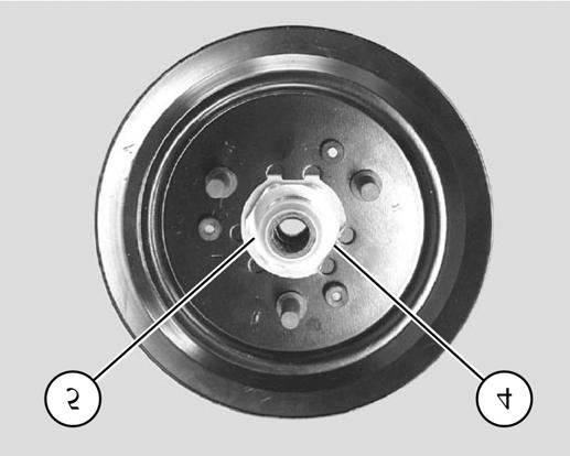 (3) - Fold down the nut locking tab (4) - Remove the nut (5) with the wrench - Remove the