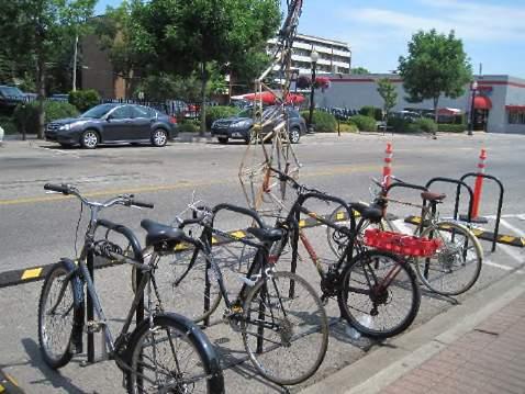 This is a preferred bike rack that allows for parking of two bicycles and provides two points of contact and allows for the use of a U lock to secure the bike.