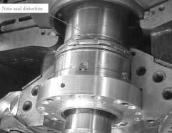 18 PROCEEDINGS OF THE THIRTY-SECOND TURBOMACHINERY SYMPOSIUM 2003 previous design stationary abradable seal failing catastrophically when process pressure closed the seal onto the shaft.