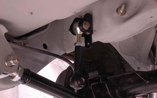 Do not fully tighten the bolts at this time. Bushing Housing Assembly 17.