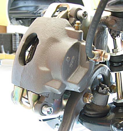 11. Mount the calipers and flex hose Your new calipers come fully loaded with pads, bolts, and copper washers.