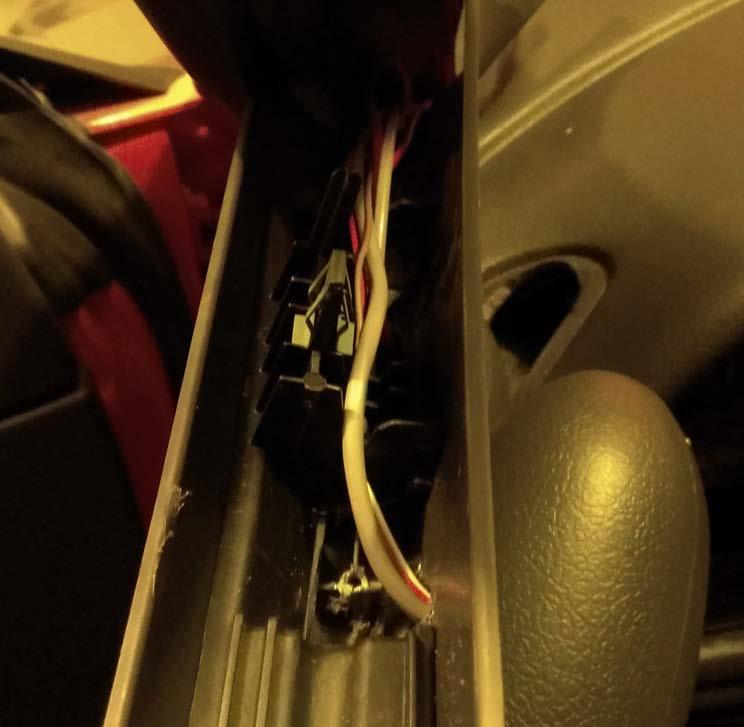 28. Carefully install your Auto Meter Boost gauge into the front of your gauge pillar, and plug the wiring harness into the back. 29.
