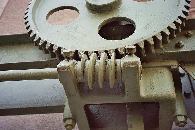 As the handle of the drill is turned in a vertical direction, the bevel gears change the rotation of