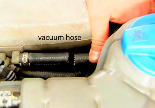 Section 1 - un the Vacuum Line - Install the Transducer Step 1 - Under the hood- Install the vacuum tee. Open the hood.