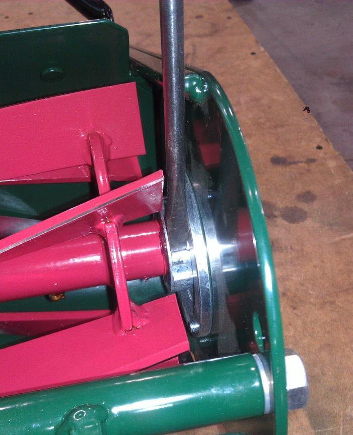 If the reel blades are too close to the cutter bar, and the reel will not spin, place the screw driver