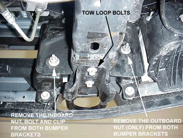 center screw securing the plastic fascia to the bumper. Figure 3 3. Remove the bumper. Note the spacing between the bumper and fascia.