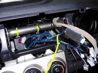 Side Cutters b. c. Secure module to crossbar behind the radio (Fig.1-16). Connect main wire harness to matching vehicle radio harness. Secure main wire harness to vehicle harness.