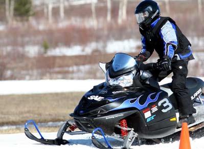 Clean Snowmobile Challenge TM Houghton, Michigan This design competition challenges students to costeffectively reengineer an existing snowmobile to reduce emissions and noise while maintaining or