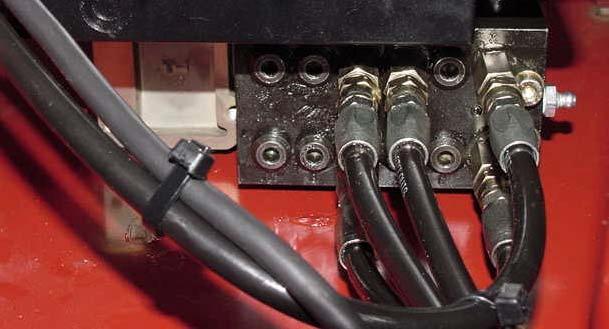Route the Power cord through engine compartment to the right side of the