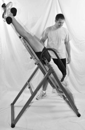 If the inversion table inverts too quickly, set the Height Adjustment Tube downwards one position at a time until you find the desired height setting.
