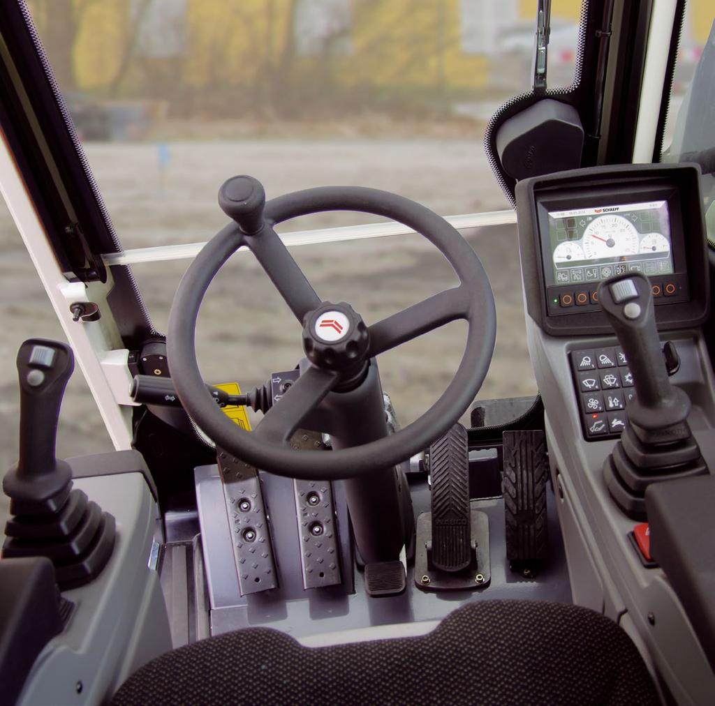 EXPERIENCE COMFORT The cab The ergonomically-designed cab provides the operator with an