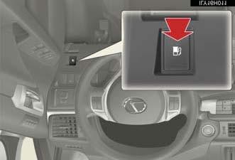 OUT OF FUEL SERVICE: The fuel filler is located on the left-hand (driver s) side of the vehicle s rear quarter panel and is covered by a locking door.