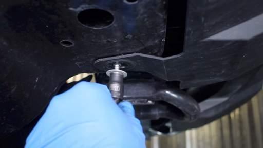 apron screws using a 10 mm socket.
