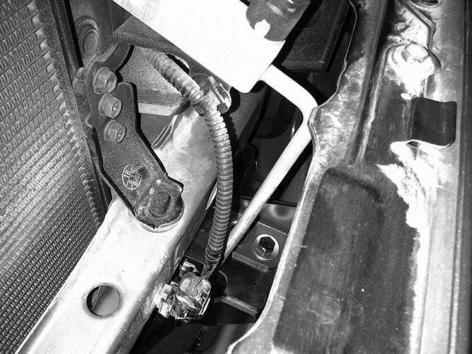 rotate Grille Guard up and in position (Fig 10B) Driver side 07-13 pictured from above Fig 11 Insert a Plastic Washer between the Grille Guard and the Frame Mounting