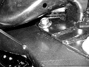 TRACK BAR BRACKET INSTALLATION 25. Install the trackbar bracket with factory bolt through the original trackbar hole. 26.