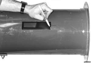 Installation Figure 12. Marking Auger NOTE: The outside edge of the flighting is heat treated, requiring grinding a notch before the flighting can be cut with a hacksaw. 10.