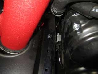 Secure the heat shield to engine bay with