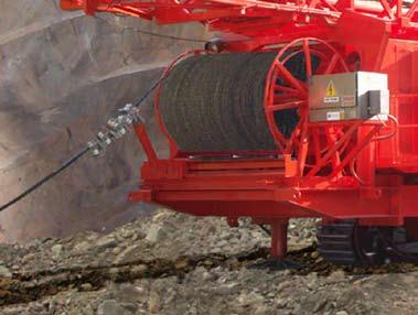 An auxiliary winch is provided on the D90KS and 1190E for lifting tools, with a rating of 2971 kg (6550 lb) on the mean drum. Line speed 37,5 m/min (123 fpm), up and down.