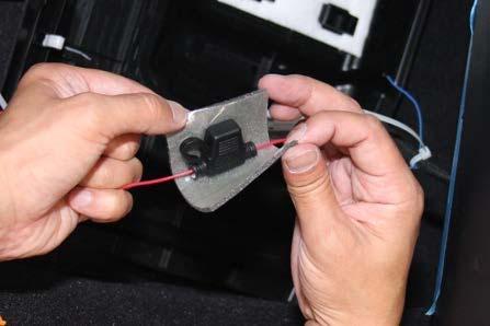 (m) Apply foam tape over the fuse holder (Fig. 3-10). NOTE: Do not cover the fuse holder cap.