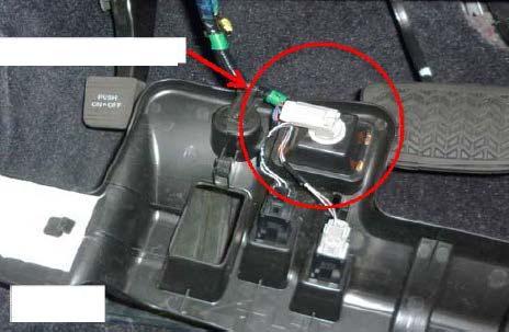 Location of connectors (n) Pull down the driver side under dash trim panel to expose the foot
