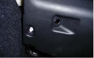 (2) Pull panel outward toward the rear of the vehicle to disengage 2 guides.