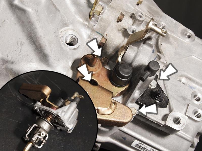 Unbolt and remove the shift lever assembly and the two dowel pins that line it up with the transmission case.