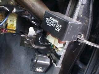Here is a shot of where the main relay is mounted in the MK3 CRX and MK4 Civic.