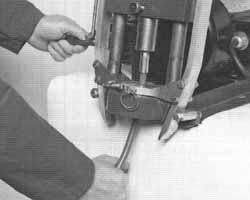 assembly.) 5. Insert the specified die and pusher into the swaging machine.
