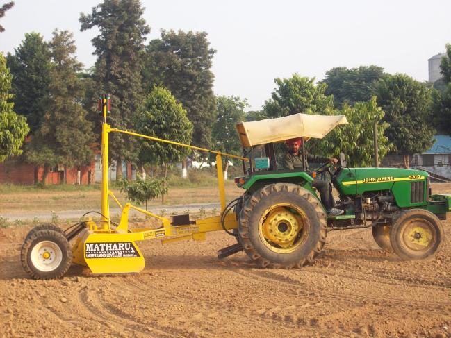 4) or animal operated improved levelers are also used in India. The laser guided leveler operated by tractor is shown in Plate : 15.