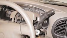 APPLY SOAPY WATER ALONG SHIFT SELECT LEVER TO EASE DISASSEMBLY; REMOVE UPPER STEERING COLUMN SHROUD FIGURE 10 &12 2.