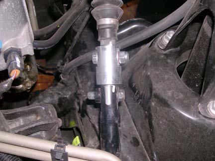 Failure to do so may cause steering malfunction, resulting in property damage or serious personal injury. a. Install kit extension (steering) into lower steering shaft.