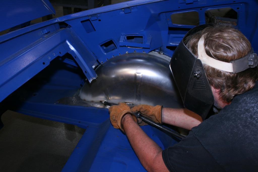 9. Return to inside the car and stitch weld the Deep Tub to the floor pan.