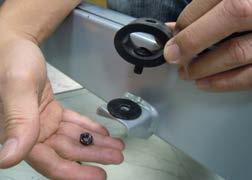 4. 2) Holding the bolt with a 5 mm Allen wrench, loosen the nut with a