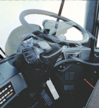 Kick-down switch Ergonomically-Designed Controls All controls are ergonomically designed to minimize operator fatigue. The steering wheel and instrument panel are similar to those of a car.
