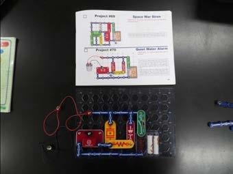 Construct project #70 (Quiet Water Alarm) from the Electronic Snap Circuits Kit. 2.