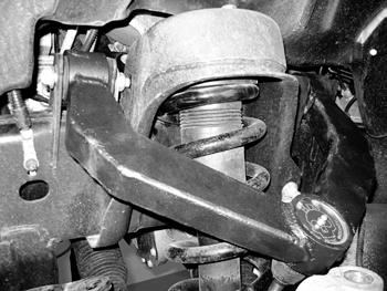 17. Grease the upper control arm assembly once installed. Fig. 4 Figure 4 18. Reinstall brake rotors and calipers with factory hardware. Tighten to 130 ft-lbs 19.