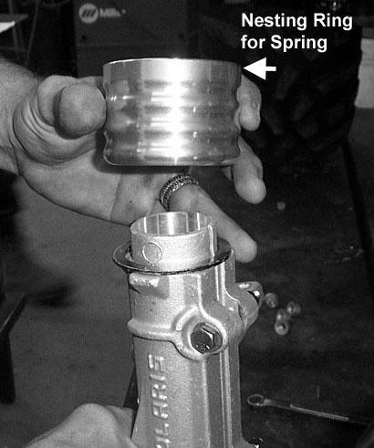 large front spring spacer on the top of the