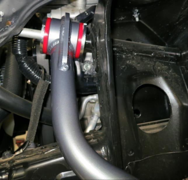 ) Start install of control arm by greasing the bushing face on both sides of the control arms.
