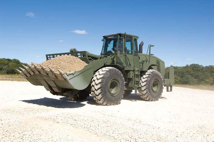 MISSION CAPABLE The Cat 966H Tested, Proven, and Reliable Mission Capable ATTACHMENTS Each of these attachments increases the capability and versatility of the