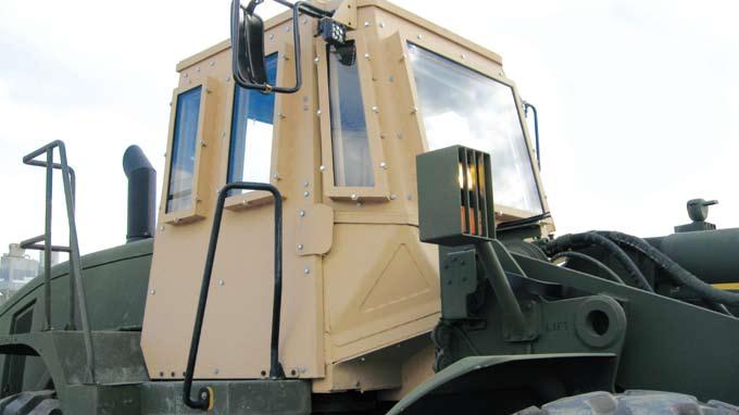 The armored cab provides the operator with 360 protection, including the roof and the floor, from small arms and fragmentation threats.