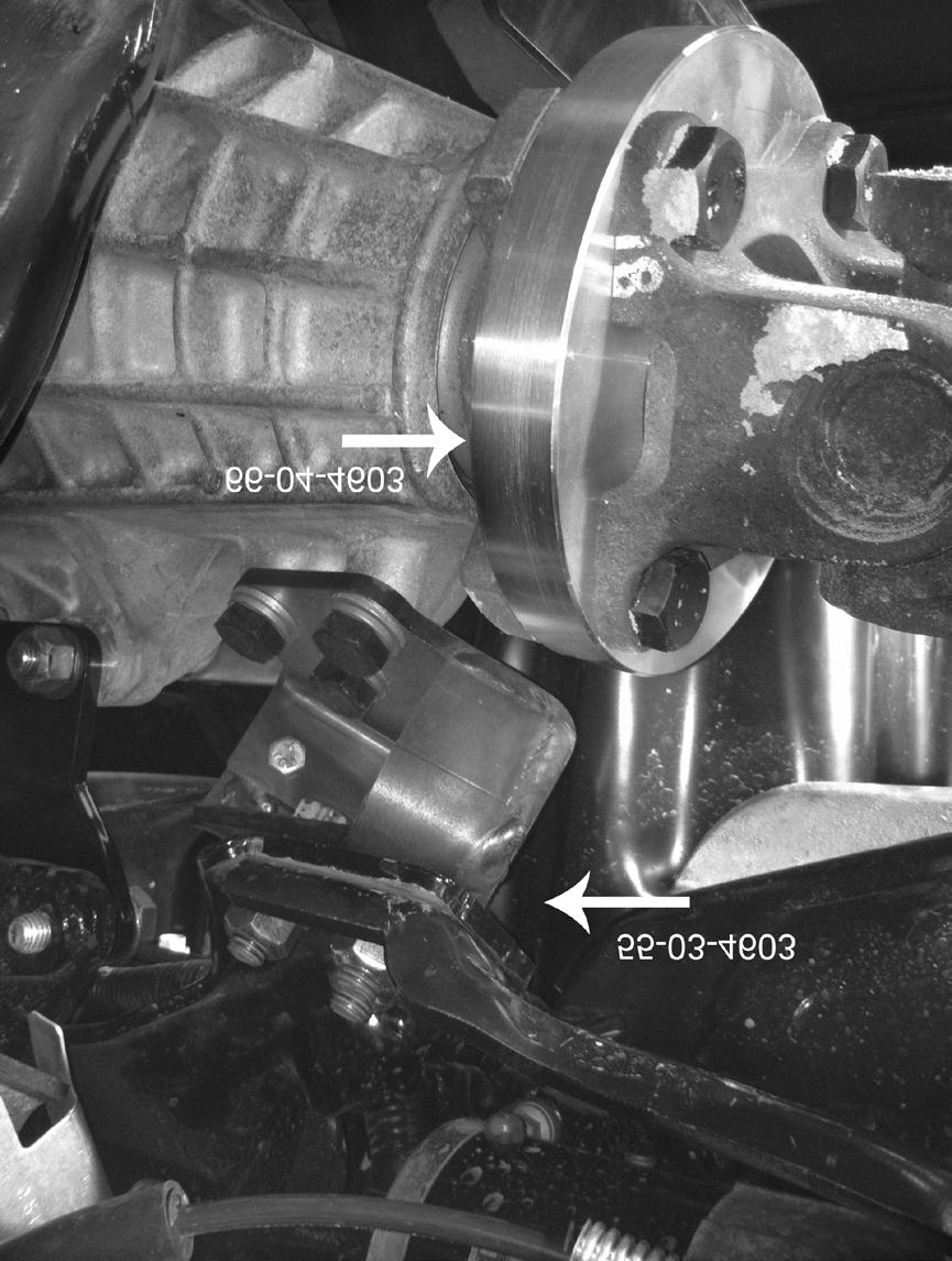 12) CV AXLES On each side, disconnect the inner CV axle assembly from the differential. Use two pry bars, positioned between the inner CV and the differential housing, to free the axles.