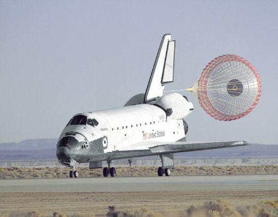 Braking parachute used on the Space Shuttle In addition to brakes and aerodynamic devices, an airplane's engines can also be used to help bring the vehicle to a stop.
