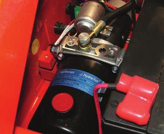The hydraulic oil can be topped up by adding oil to the filler as highlighted below. Take care not to spill hydraulic fluid over any of the surrounding machine components.