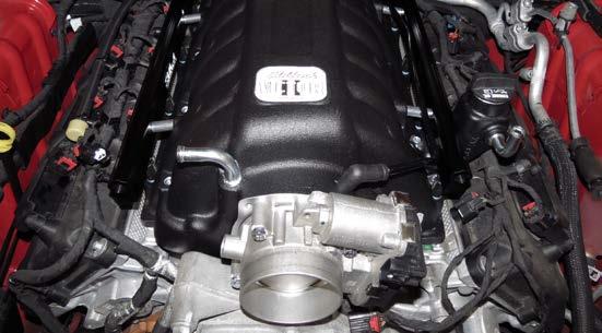 34. Using the provided throttle body gasket and four (4) M6 x 40mm bolts, secure the