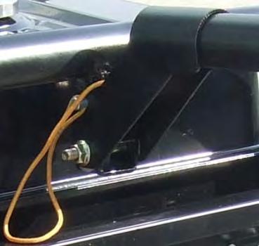 Locate the handle-mounting bracket on the generator frame.
