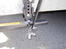 Tow Tech Feature 6 7 8 6. Hook the trailer up and lift the spring bars onto the brackets with the supplied tool.
