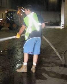 Workers also use fire hoses and pressure washers to keep the pavement clean and reduce