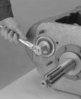 Remove the Rear Snap Ring from the Rear Upper Countershaft Bearing. Transmission Overhaul Procedures - Bench Service 2.